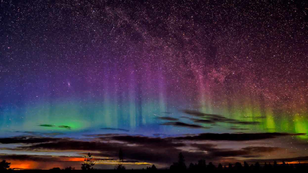 Aurora expert Donald Burghardt explaining the Northern Lights during a special aurora dinner experience in Rovaniemi